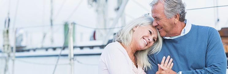 Smiling couple sailboat